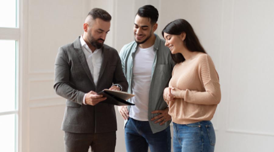 image of a couple talking with the agent